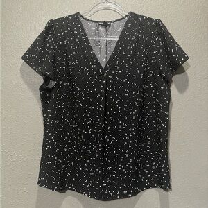 Black and white polkadot blouse